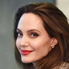 Angelina Jolie's Timeless Coat and Boots Go Together Like PB&J